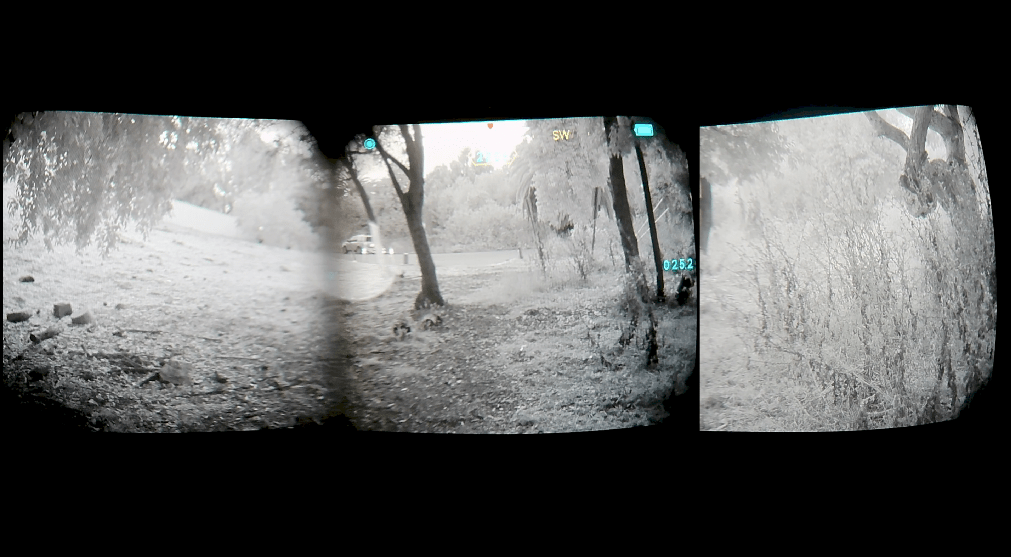 A quad pano night-vision outdoor scene showing trees, grass, and a snowy or bare ground surface, with black letterbox bars around the three panels.